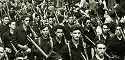 Miembros de Falange Española desfilando por San Sebastián en septiembre de 1936